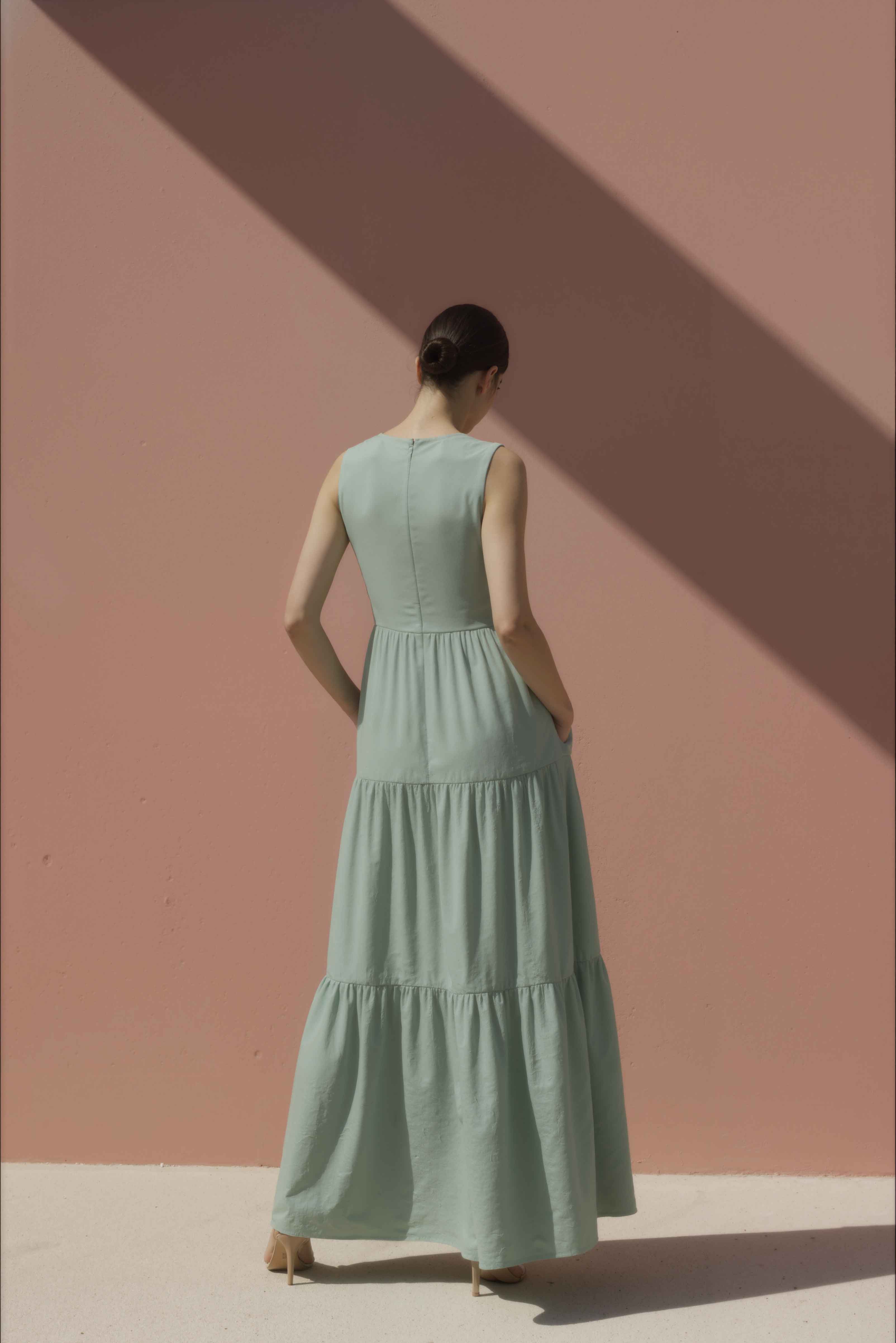 Women in Sage Green High-Neck Tiered Cotton Maxi Dress
